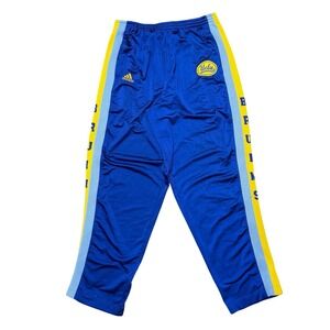 Vintage Y2K UCLA Bruins basketball warm up pants with breakaway snap buttons